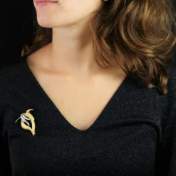 Broche vintage en or amati et diamants