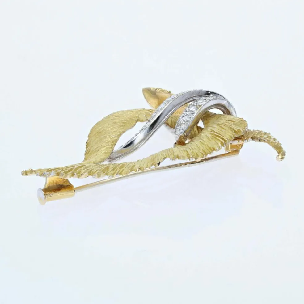 Broche vintage en or amati et diamants