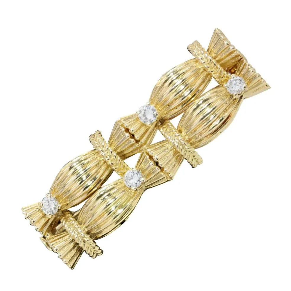 Broche vintage fagots d'or et diamants