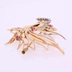 Broche vintage oiseau de paradis diamants émeraudes rubis