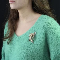 Broche vintage oiseau de paradis diamants émeraudes rubis