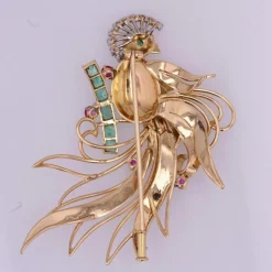 Broche vintage oiseau de paradis diamants émeraudes rubis