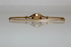 Broche-barrette Art Déco opale et rubis