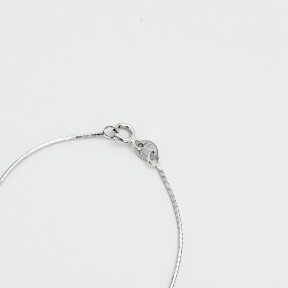 Chaine à maille serpent or gris et diamant