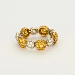 CHANTECLER - Bagues souples en or jaune et or gris, diamants et saphirs jaune