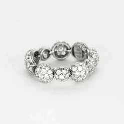 CHANTECLER - Bagues souples en or jaune et or gris, diamants et saphirs jaune