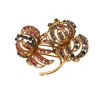 Clip chrysanthèmes or jaune, rubis et saphirs