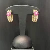 Clips d'oreilles en or jaune diamants et rubis