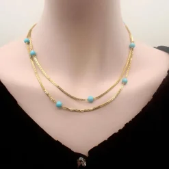 Collier 36 stations en perles turquoise dorées