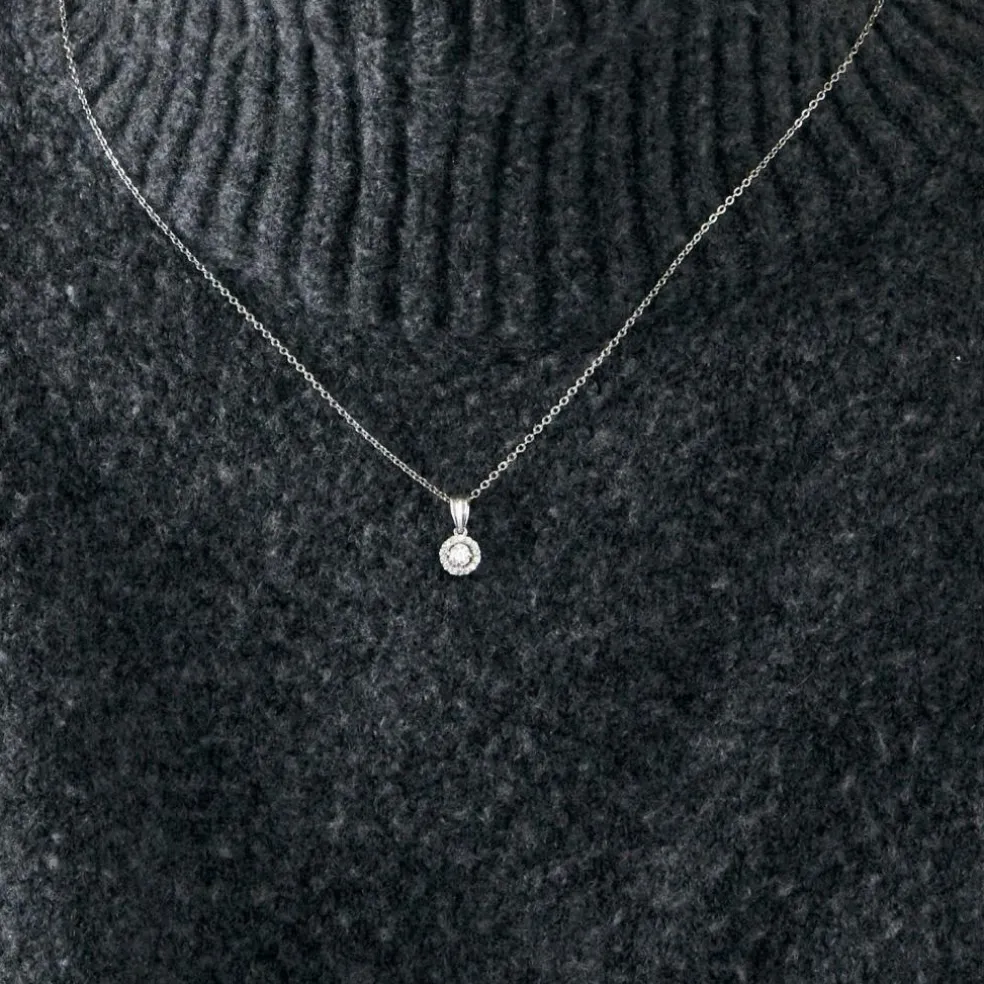 Collier avec pendentif en or gris et diamants