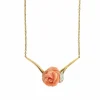 Collier avec rose corail et diamants