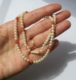 Collier choker or rose perles de culture Akoya corail