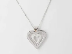 Collier coeur en or blanc et diamants