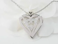 Collier coeur en or blanc et diamants