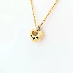 Collier coeur en or jaune et diamants
