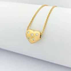 Collier cœur en or jaune et diamants