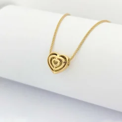 Collier cœur en or jaune et diamants