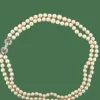 Collier de perles avec fermeture en or blanc et diamants