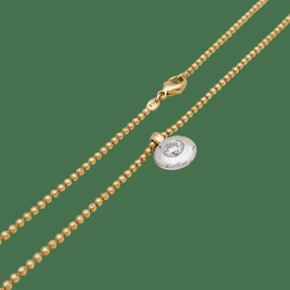 Collier deux ors, diamant.