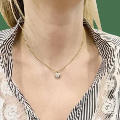 Collier deux ors, diamant.