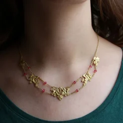 Collier draperie ancien or et spinelles