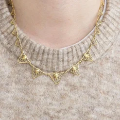 Collier draperie en or jaune maille filigrane