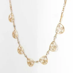 Collier draperie or jaune maille filigrane