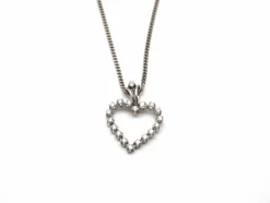 Collier en or blanc 750 mil et pendentif cœur en diamants
