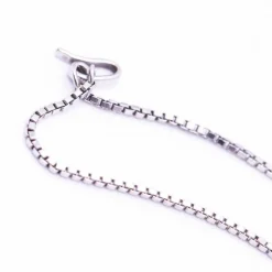Collier en or blanc, opale, diamants et émeraude