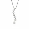 Collier en or gris et pendentifs en diamants