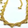 Collier en or jaune 18 carats à décor de petites boules