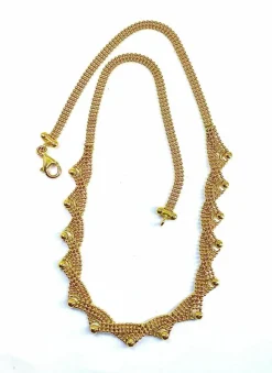Collier en or jaune 18 carats à décor de petites boules