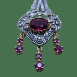 Collier en or jaune argent diamants rubis