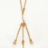 Collier en or jaune centré d'une châtelaine