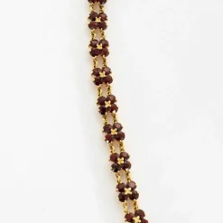 Collier en or jaune et grenat
