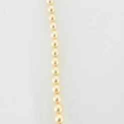 Collier en or jaune et perles blanches