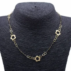 Collier en or jaune et spinelle motif floral