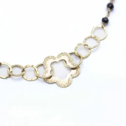 Collier en or jaune et spinelle motif floral