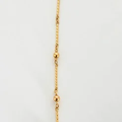 Collier en or jaune maille tressée