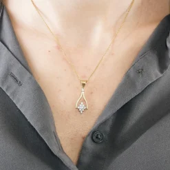 Collier en or jaune mobile avec saphirs et diamants