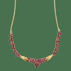 Collier en or jaune, rubis ovales facettés