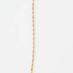 Collier en or jaune, rubis ovales facettés