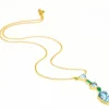 Collier en or jaune topaze émeraude