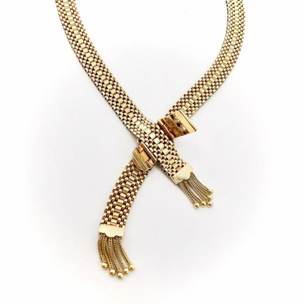collier en or tressé avec fermoir à boucle et pompons