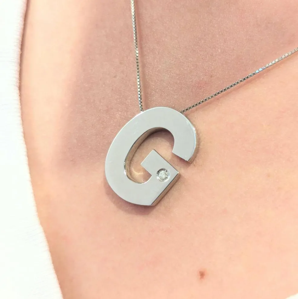 Collier G or blanc et diamant