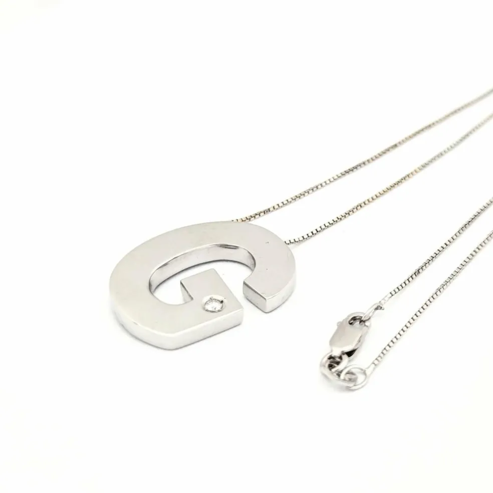 Collier G or blanc et diamant