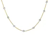 Collier gouttière en deux tons d'or serti de diamants.
