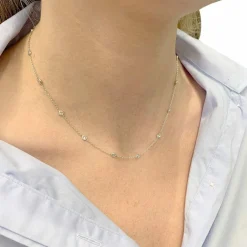 Collier gouttière en or blanc, diamants.