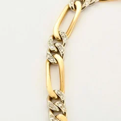 Collier maille figaro en or jaune et gris, et diamants