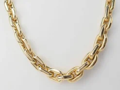 Collier maille forcat limée en chute en or jaune et diamant
